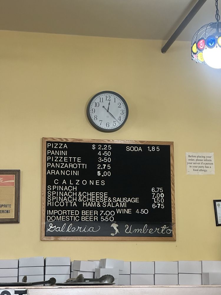 Handwritten menu board with prices